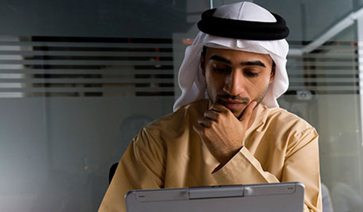Arab man on laptop