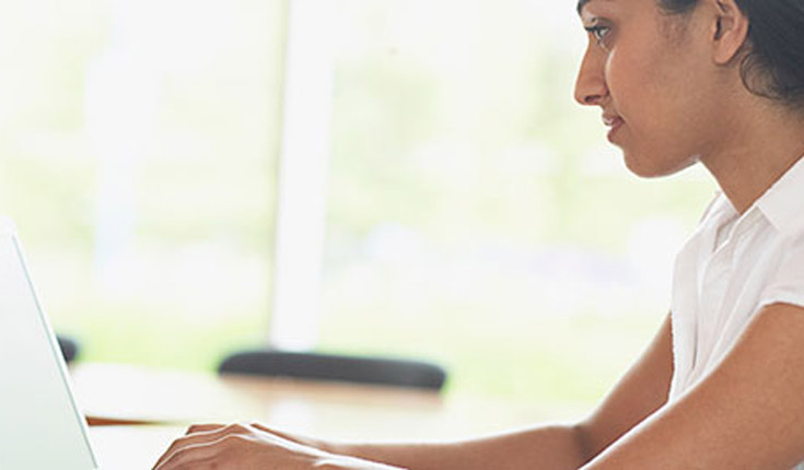 Indian woman on laptop