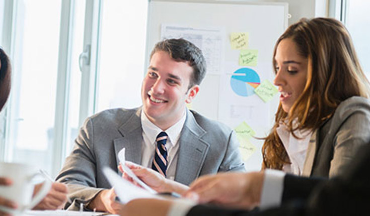 man and woman in meeting