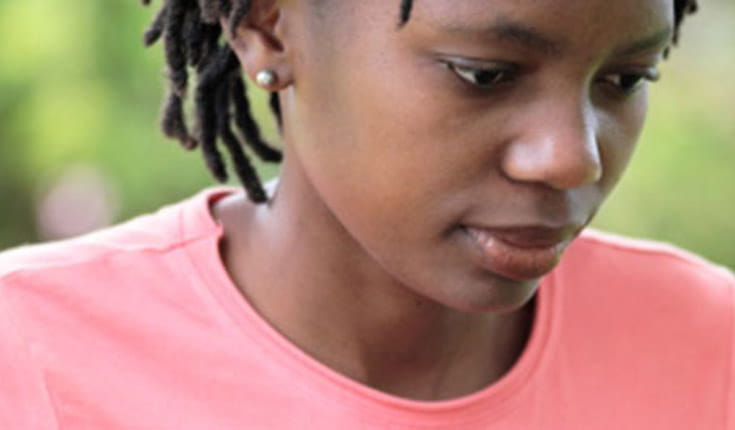 woman in pink shirt