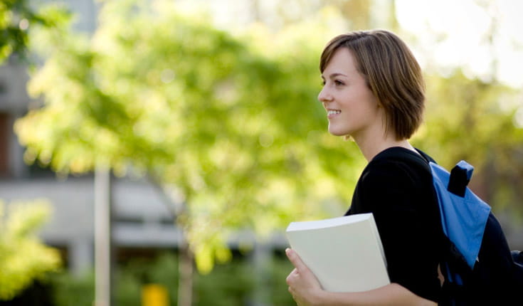 Woman with blue backpack