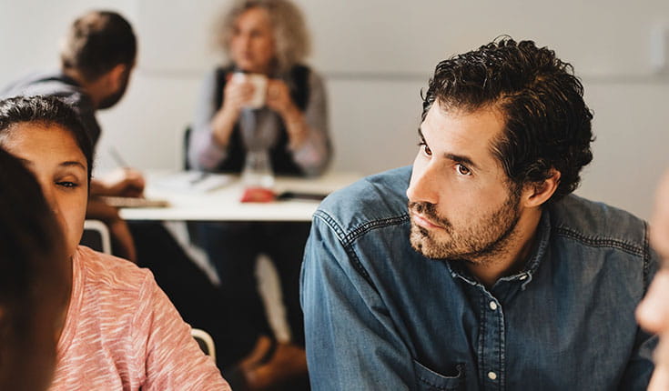 man listening intently