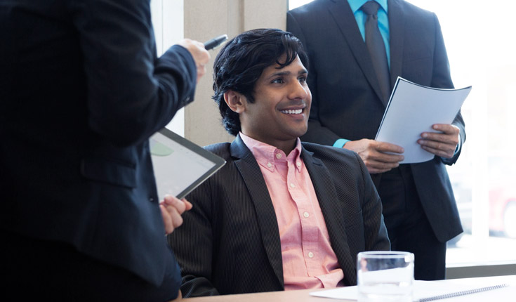 smiling man in meeting