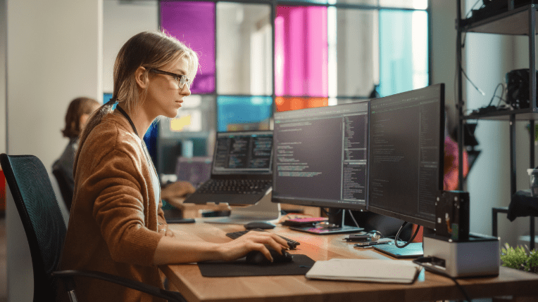 Female coder at computer