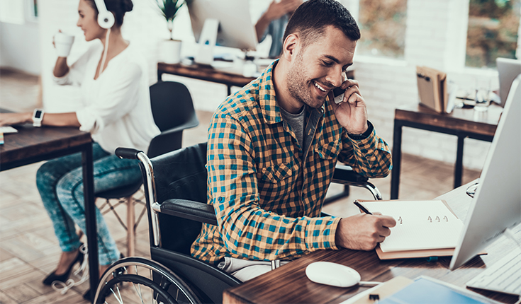 Man in Wheelchair Takes Call 
