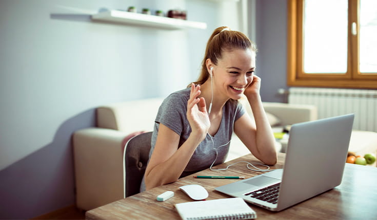 Amused Woman at Laptop